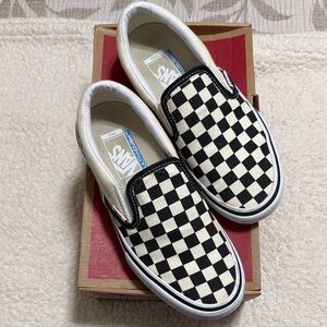 Vans Black and White Checkerboard Slip-Ons